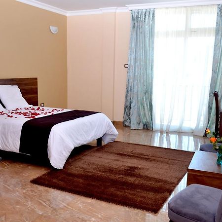 Melodie Hotel Адис Абеба Екстериор снимка